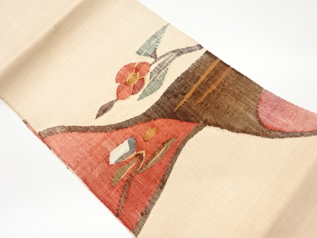 手織り紬抽象に椿模様織出し名古屋帯